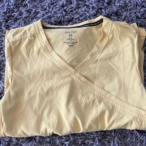 Xsmall wonder wink yellow scrub top